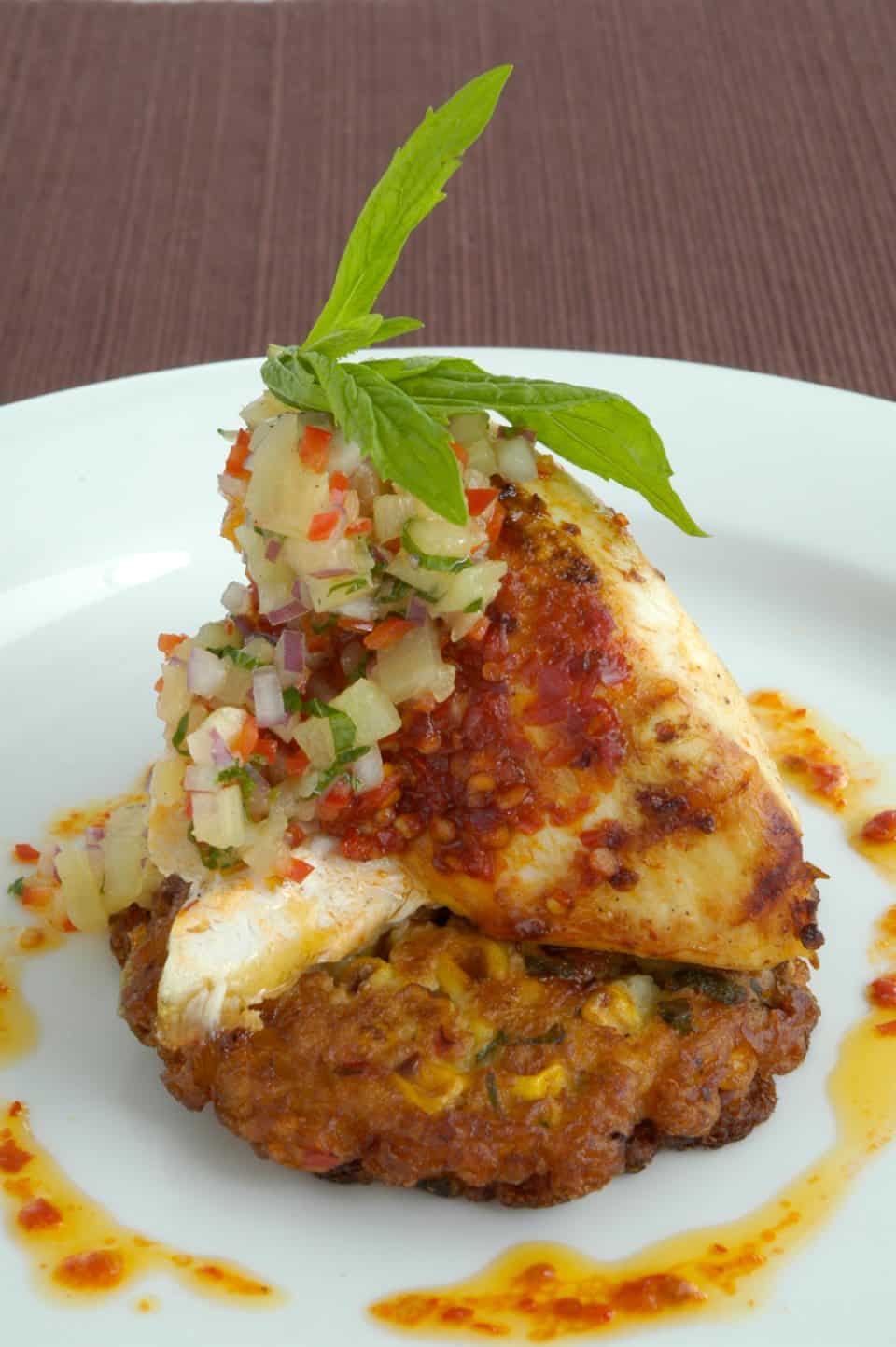 Harissa Chicken on Corn & Coriander Fritters with Pineapple Salsa