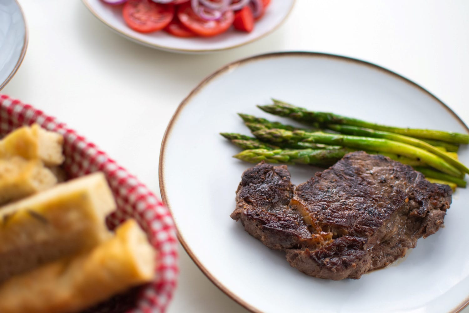 Beef Tenderloin with Asparagus and Tomato Salad