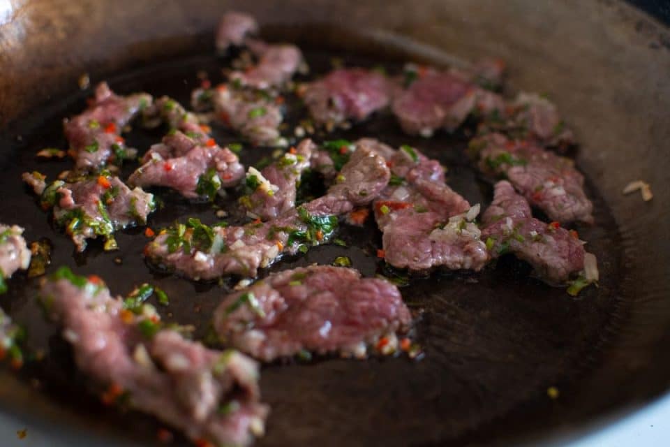 Frying thinly sliced ribeye