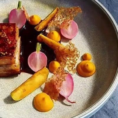 Pork Belly With Baked Radish, Carrot Puree and Caramelized Apples