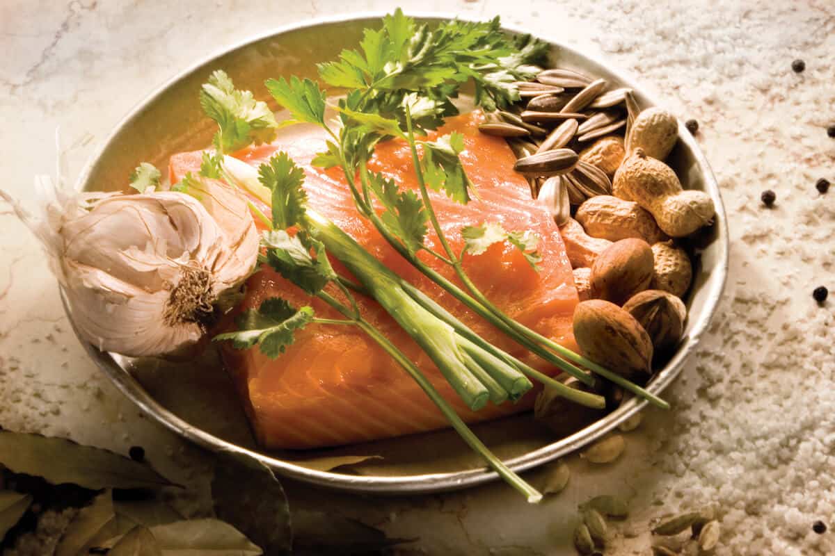 SALMON CONFIT WITH HERBS AND NUTS