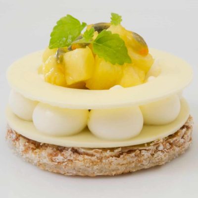 Coconut Dacquoise w/ Piña Colada Cream & Tropical Compote